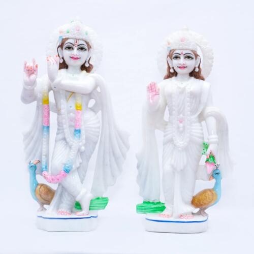 Makrana Marble Murti of Radha Krishna with Two Graceful Peacocks in the Background