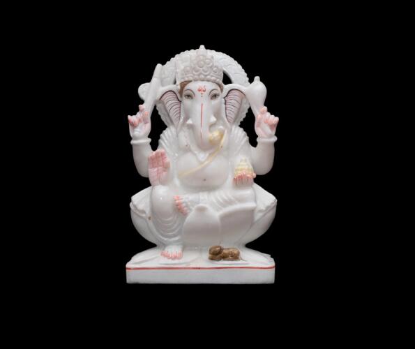 Divine Marble Murti of Ganesh Ji Holding a Ladoo in His Left Hand – Symbol of Prosperity and Joy